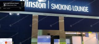Winston Smoking Lounge illuminated sign at Dubai International Airport Terminal 3