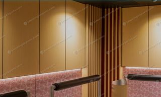 Warm wood-paneled smoking room interior at Osaka Itami Airport with standing ashtrays and accent lighting