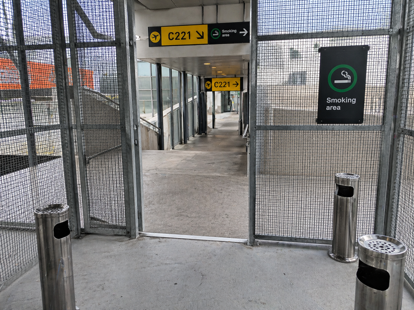 C221 smoking cage door