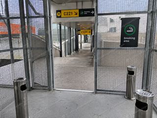 C221 smoking cage door
